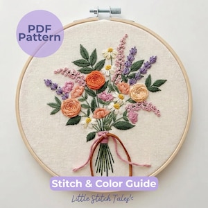 May include: A round wooden embroidery hoop containing a fabric panel with a hand-stitched floral bouquet featuring orange, peach, pink, purple, and white flowers with green leaves, tied with a pink ribbon. Text reads PDF Pattern Stitch & Color Guide.