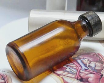 Vintage 1950s Amber Glass Apothecary Small Medicine Bottle with Vintage Label Bakelite Stopper