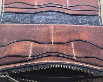 Women's Clutch Wallet w/ Floral Concho. Horween Olde English Leather and Antique Brass Snaps. 10 Card & 3 Cash Pockets. One Zippered Pocket.