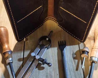Long Wallet (8 1/2") Made from Dark Brown Crazy Horse Leather. 6 Card Pockets, 2 Cash Pockets.