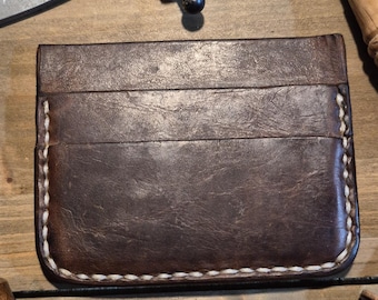 Front Pocket Wallet. 4 Card Pocket, 1 Cash/Stash Pocket.