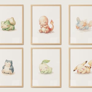 May include: Six framed watercolour prints featuring Pokémon characters. Each print shows a different Pokémon in a sleeping pose, with soft colours and gentle details. The frames are a light wood colour.
