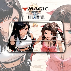 May include: A rectangular playmat featuring anime-style illustrations of two female characters from Final Fantasy, with the Magic: The Gathering and Final Fantasy logos. The playmat has designated zones for cards.