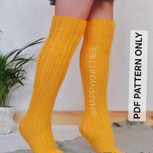 May include: Bright yellow, ribbed-knit knee-high socks. The socks are a solid color and have a textured appearance. The text "PDF PATTERN ONLY" and "YELLOW" are visible. The Instagram handle @HAPPYKNITTIES is also visible.