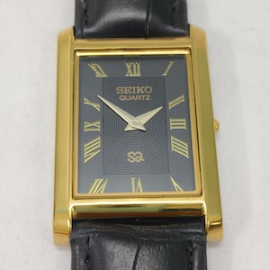Vintage Seiko Slim Quartz Black Golden Rectangular Men's Wrist Watch- VintageauthenticCo