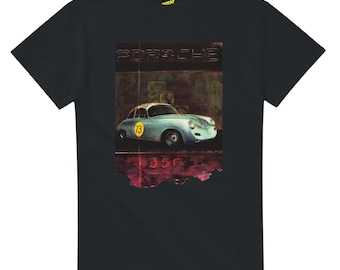 May include: Black t-shirt featuring a vintage Porsche 356 car graphic. The graphic includes the word "PORSCHE" and the number "73" on the car. The car is light blue with a yellow circle and the text "356" below.