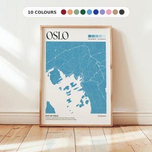 May include: A framed map print of Oslo, Norway, in shades of blue and white. The map details the city's layout, with the word "OSLO" at the top. The text "CITY OF OSLO" and a description are at the bottom. A color palette is displayed above the map.
