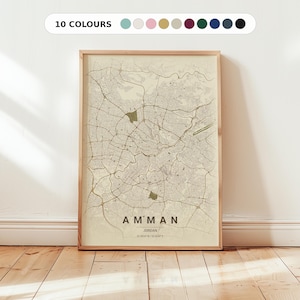 Peut inclure: Une impression encadrée d'une carte d'Amman, en Jordanie, dans une palette de couleurs neutres. La carte détaille la disposition de la ville, avec les rues et les points de repère visibles. Le texte "AMMAN" est affiché en évidence en bas, avec les coordonnées. Le cadre est de couleur bois clair, et le texte "10 COULEURS" est en haut.