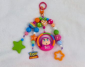 Ciondolo per borsa con perline ispirato a Toy Story / Ciondolo per zaino Woody Buzz Jessie Lotso