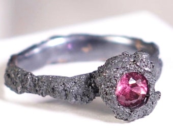 Fairtrade Rubelite Solitaire Ring with Black Fair Silver Sur le Sable Collection Oxidised Unique Textured Silver Ring Volcanic Inspiration