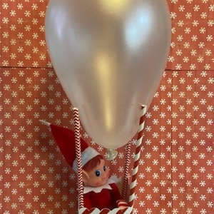 Ankomst-/avgångset för älvballonger: låda, sugrör, valfri ballonguppsättning