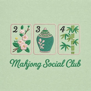 May include: Embroidered design featuring three Mahjong tiles with the numbers 2, 3, and 4. The tiles display floral, vase, and bamboo motifs. The text "Mahjong Social Club" is embroidered below the tiles on a light green background.