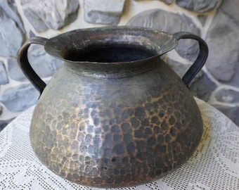 An antique handmade hammered copper cauldron masterpiece from Egyptian copper