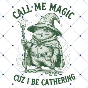 May include: An illustration of a frog wizard, wearing a hat with a crescent moon and stars, and holding a star-topped staff. The text reads "CALL ME MAGIC CUZ I BE GATHERING". The frog is in shades of green and grey, with a cape and belt.