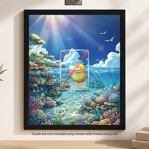 May include: Framed artwork featuring a vibrant underwater scene with a Psyduck trading card. The artwork showcases colorful coral reefs, fish, and a sunny sky. The frame is black, and the text "Cards are not included only comes with frame and print" is visible.