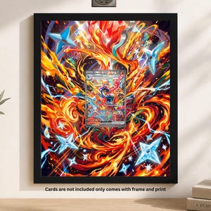 Könnte beinhalten: Schwarz gerahmtes Kunstwerk mit einem feurigen, orange-roten Hintergrund und einer zentralen Sammelkartenillustration. Das Kunstwerk enthält blaue sternförmige Akzente und den Text "Greninja-310". Der Text unten lautet "Cards are not included only comes with frame and print."