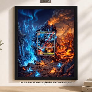 May include: Black framed print of a fantasy scene divided by ice and fire, with a trading card at the centre. The artwork shows a volcanic landscape on one side and an icy realm on the other. Text at the bottom reads "Cards are not included only comes with frame and print."