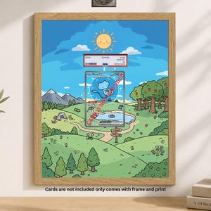 May include: A framed print featuring a cartoon landscape with a sunny sky, trees, and a lake. A graded card is visible in the center. The frame is light brown. Text at the bottom reads: "Cards are not included only comes with frame and print."