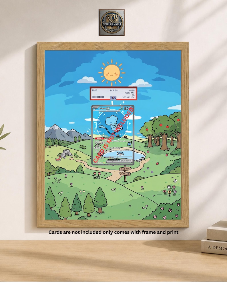 May include: A framed print featuring a cartoon landscape with a sunny sky, trees, and a lake. A graded card is visible in the center. The frame is light brown. Text at the bottom reads: "Cards are not included only comes with frame and print."