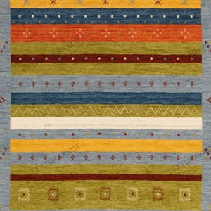 May include: A rectangular area rug with a light blue background and horizontal stripes in various colors. The stripes include orange, green, yellow, and dark blue, with decorative patterns. The rug has a textured appearance.