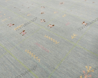 Handwoven Sky Blue Wool Gabbeh Rug: Minimal Tribal Design