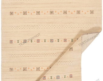 Alfombra Gabbeh de lana beige tejida a mano: alfombra tribal minimalista