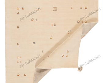 Handwoven Wool Gabbeh Rug: Beige Tribal Rug with Tassels