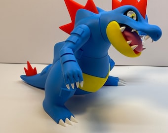 Personaje Pokémon Feraligatr impreso en 3D con múltiples piezas.