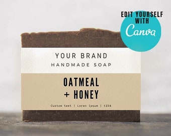 May include: A brown bar of soap with a white and beige label. The label reads "YOUR BRAND HANDMADE SOAP OATMEAL + HONEY Custom text | Loren Ipsum | 1234".