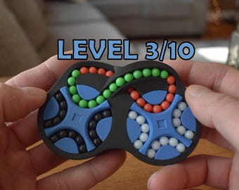 The Figure-Eight (4-Color) | Twisty Bead Puzzle | Controller-Inspired STEM Brainteaser & Satisfying Focus Toy | Ages 14+