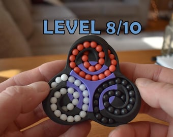 The Triad | Advanced Twisty Bead Puzzle | Challenging 3D Brainteaser | Fidgety Mechanical Puzzle | Ages 14+