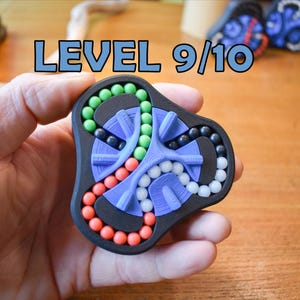 The Delta (4-Color) | Twisty Bead Puzzle | Ultra Hard 3D Brainteaser | Fidgety Mechanical Puzzle | Ages 14+