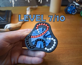 O Delta (3 Cores) | Quebra-cabeça de Contas Giratórias | Desafio 3D para o Cérebro | Quebra-cabeça Mecânico Inquieto | Para maiores de 14 anos