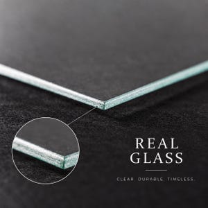 a close-up view of a clear glass surface, highlighting its transparency and smoothness.