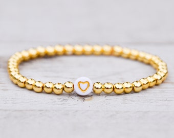 White and Gold Toned Heart Beaded Ball Bracelet