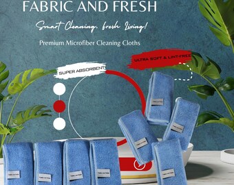 Op de afbeelding: Een verzameling blauwe microvezel schoonmaakdoeken met witte labels. De afbeelding toont de tekst "FABRIC AND FRESH" en "Smart Cleaning, fresh Living!". De doeken worden aangeprezen als "SUPER ABSORBENT" en "ULTRA SOFT & LINT-FREE".