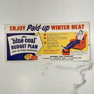 May include: A vintage advert for Godfrey Fuel Company's 'blue coal' budget plan. The ad shows a man relaxing in a chair, promoting convenient payment options and savings. The text reads 'Enjoy Paid-up Winter Heat' and 'Saves money, too!'
