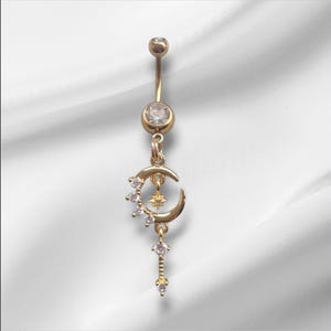 Piercing para ombligo de acero quirúrgico dorado con luna y estrellas de cristal de circonita cúbica, 14 g, hipoalergénico.