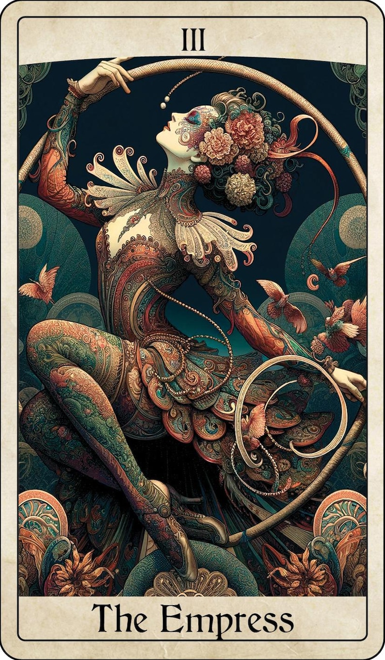 May include: Tarot card illustration of The Empress. The card features a woman in an ornate, patterned dress with floral headwear, surrounded by birds and a circular frame. The background is a dark teal with circular and floral motifs.