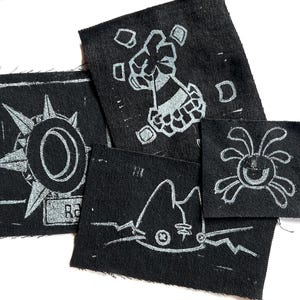 Op dierenjam geïnspireerde handgemaakte linoprint-patches