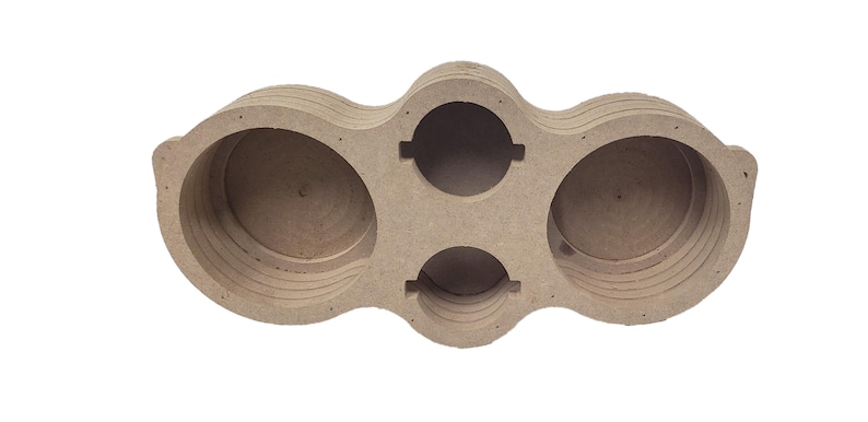 May include: A light brown, multi-compartment wooden organizer with three circular openings and two oval openings. The organizer is made of layered wood and has a symmetrical design, suitable for various storage needs.