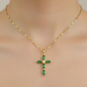 Gold cross necklace with green cubic zirconia