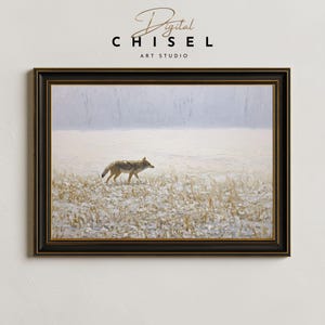May include: Framed art print depicting a coyote in a snowy landscape. The artwork has a muted colour palette and is set within a black and gold frame. The text "Digital Chisel Art Studio" is at the top of the image.