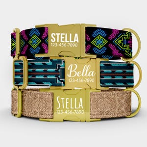 May include: Three dog collars with gold-colored buckles and hardware. The top collar has a black background with neon geometric patterns and the name "Stella" and a phone number. The middle collar has a teal and brown striped pattern and the name "Bella" and a phone number. The bottom collar has a tan pattern and the name "Stella" and a phone number.