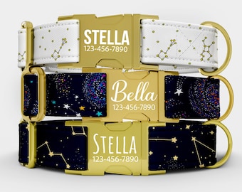 May include: Three dog collars with gold-colored buckles. The top collar is white with yellow constellation patterns. The middle collar is navy blue with a colorful galaxy design. The bottom collar is navy blue with yellow constellation patterns. Each collar has a name and phone number.