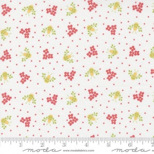 May include: White fabric with a repeating pattern of small red flowers, yellow bees with green leaves, and tiny red dots.
