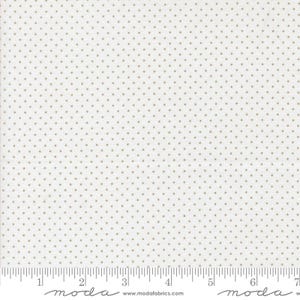 May include: Off-white fabric with a repeating pattern of small, evenly spaced, light brown dots. The fabric has a ruler printed along the bottom edge, with the word "moda" and the website address www.modafabrics.com.