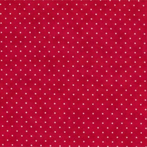 May include: Close-up of red fabric covered in a repeating pattern of small, white polka dots. The dots are evenly spaced and create a classic design. The fabric is likely cotton or a similar material, suitable for various craft projects.