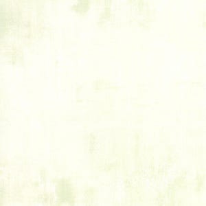 May include: A textured, off-white background with subtle variations in tone. The surface appears slightly aged or distressed, with soft, muted areas of color. The overall effect is a neutral, versatile backdrop.