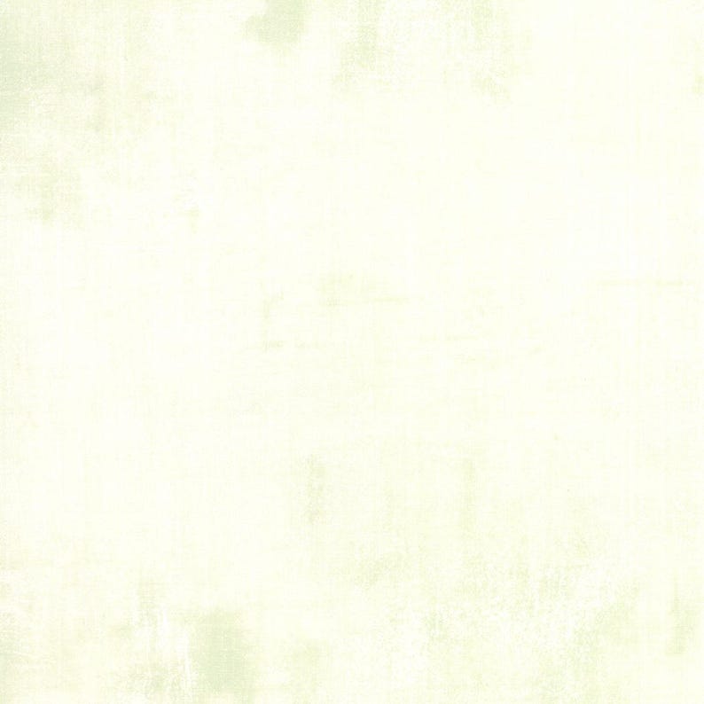 May include: A textured, off-white background with subtle variations in tone. The surface appears slightly aged or distressed, with soft, muted areas of color. The overall effect is a neutral, versatile backdrop.
